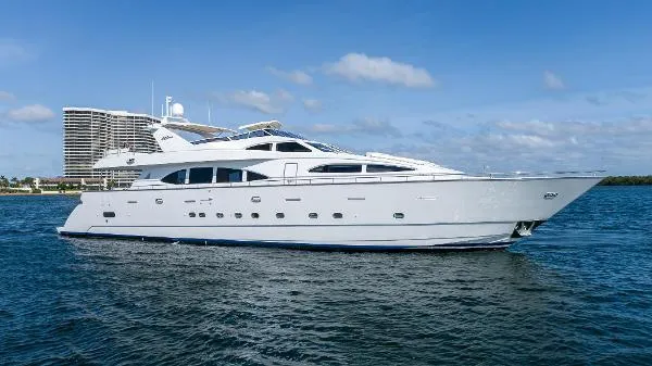 Slide: The Image of Luxurious 1999 Azimut 5 Stateroom VIP Edition yacht cruising on open water. - 1