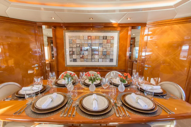 Slide: The Image of Luxurious dining area on 1999 Azimut 5 Stateroom VIP Edition yacht. - 33