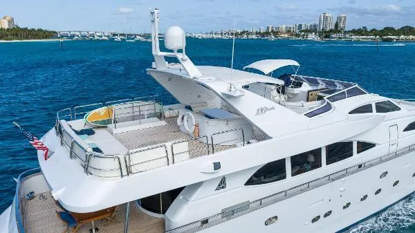 Slide: The Image of Luxurious 1999 Azimut 5 Stateroom VIP Edition yacht cruising in clear blue waters. - 7