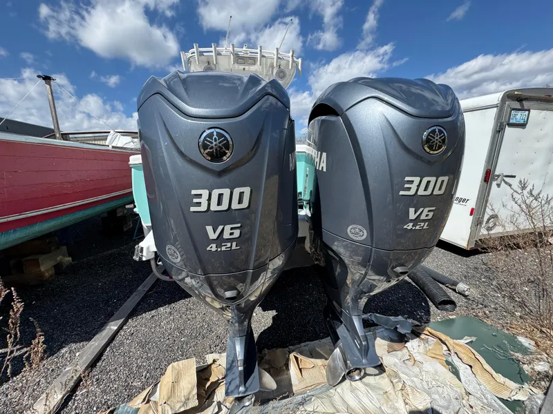 Slide: The Image of Twin Yamaha 300 V6 outboard engines on a 2006 Buddy Davis 28 Center Console boat. - 3