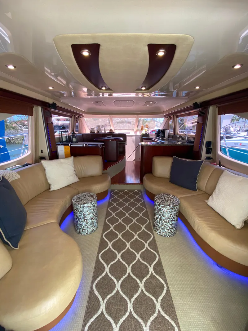 Slide: The Image of Luxurious interior of 2006 Sea Ray 580 Sedan Bridge yacht with elegant seating and modern design. - 30