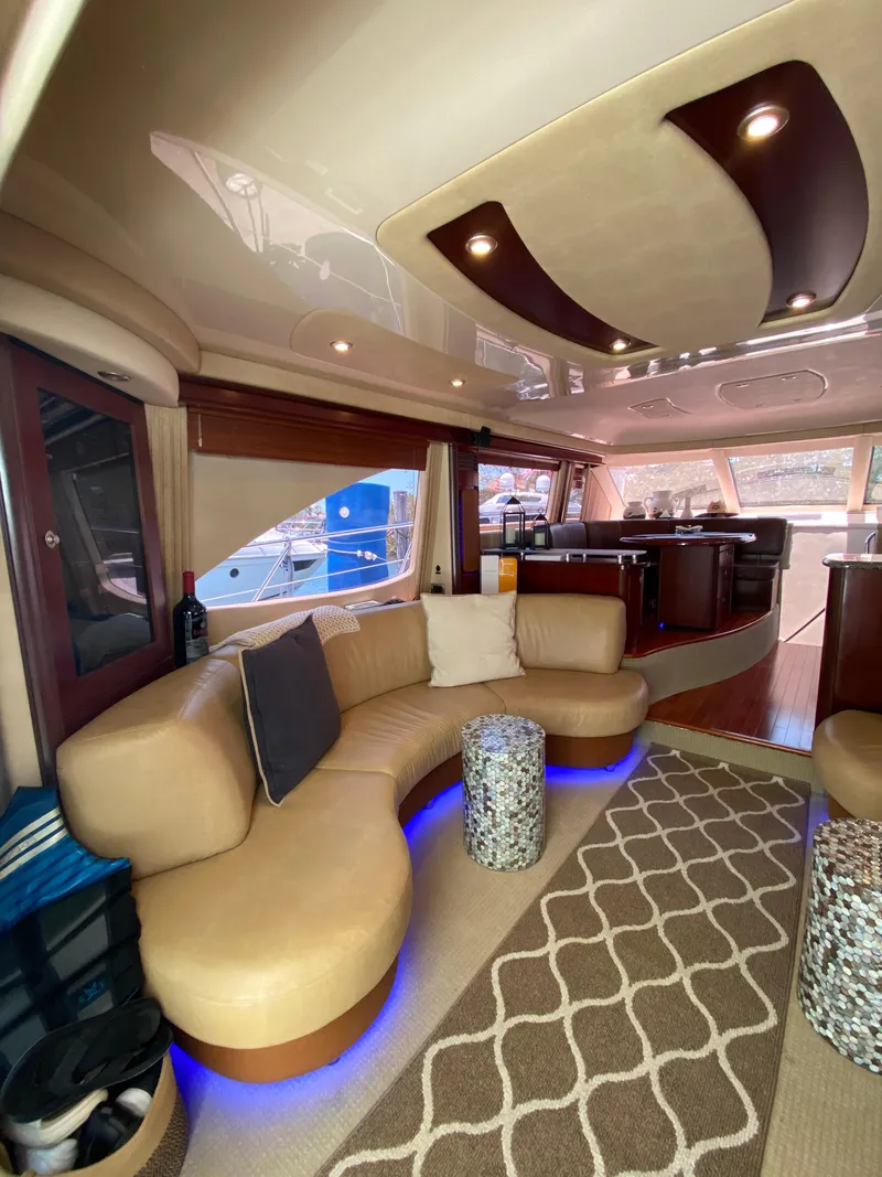 Slide: The Image of Luxurious interior of 2006 Sea Ray 580 Sedan Bridge yacht with elegant seating and modern design. - 31