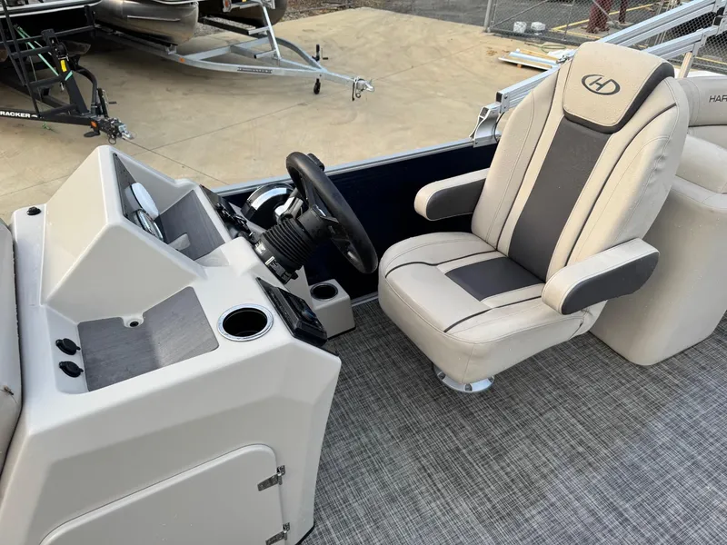 Slide: The Image of Captain's seat and helm of 2023 Harris 230 CRUISER pontoon boat. - 7