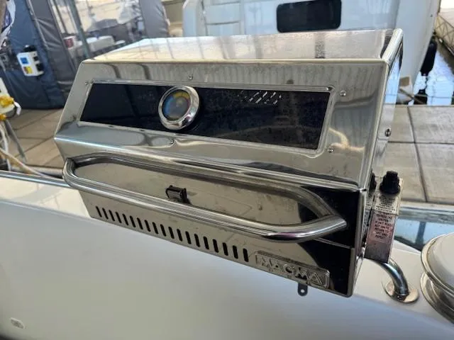 Slide: The Image of Stainless steel grill on 2003 Carver 410 Sport Sedan yacht deck. - 24