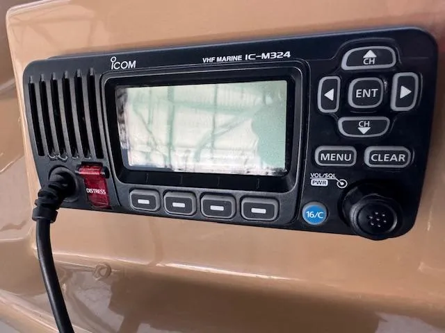 Slide: The Image of VHF marine radio IC-M324 on 2003 Carver 410 Sport Sedan boat. - 34