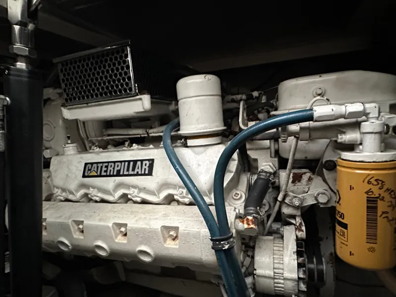 Slide: The Image of Caterpillar engine in a 2000 Cabo 35 Express boat. - 6