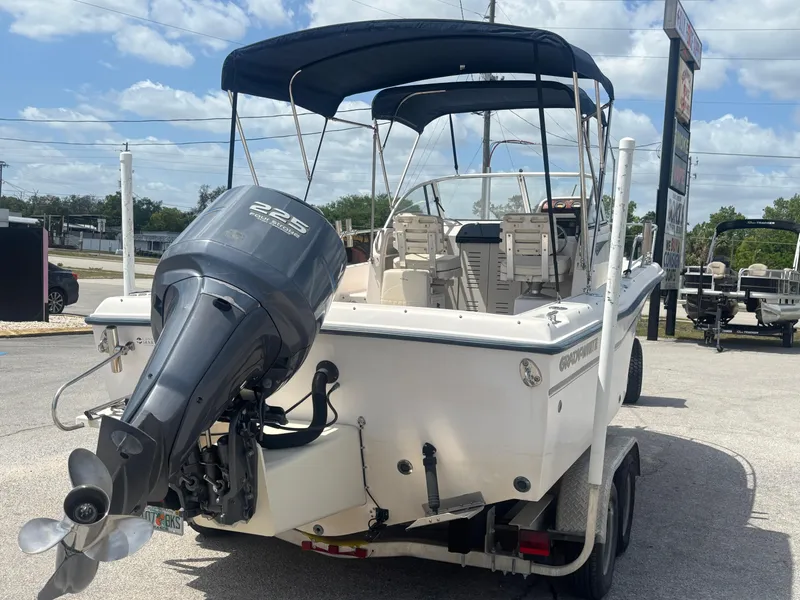 Slide: The Image of 2000 Grady-White 228 Seafarer boat with outboard motor on trailer. - 14