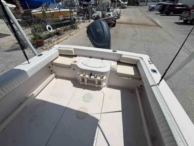 Slide: The Image of 2000 Grady-White 228 Seafarer boat interior with seating and storage compartments. - 22