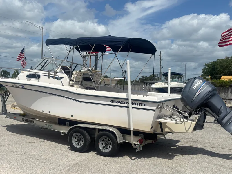 Slide: The Image of 2000 Grady-White 228 Seafarer boat on trailer with Yamaha outboard motor. - 3