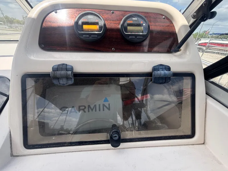 Slide: The Image of Dashboard of 2000 Grady-White 228 Seafarer with Garmin navigation system and gauges. - 34