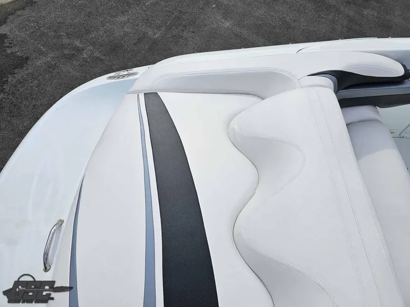 Slide: The Image of 2003 Baja .38 Special boat with sleek white and black seating design. - 36