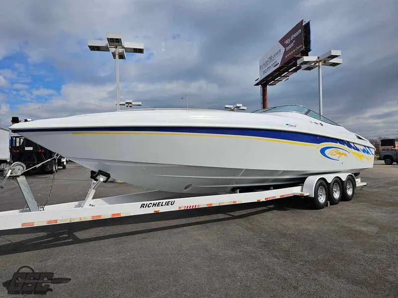 Slide: The Image of 2003 Baja .38 Special speedboat on a trailer under cloudy skies. - 4