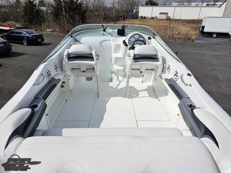 Slide: The Image of 2003 Baja .38 Special boat interior with dual seats and steering console. - 47