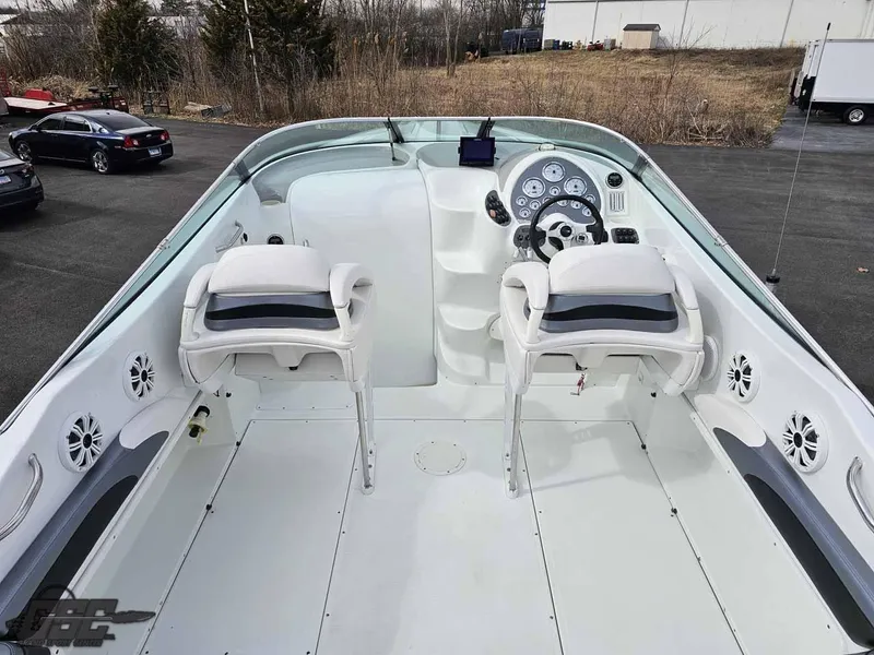 Slide: The Image of 2003 Baja .38 Special boat cockpit with dual seats and control panel. - 48