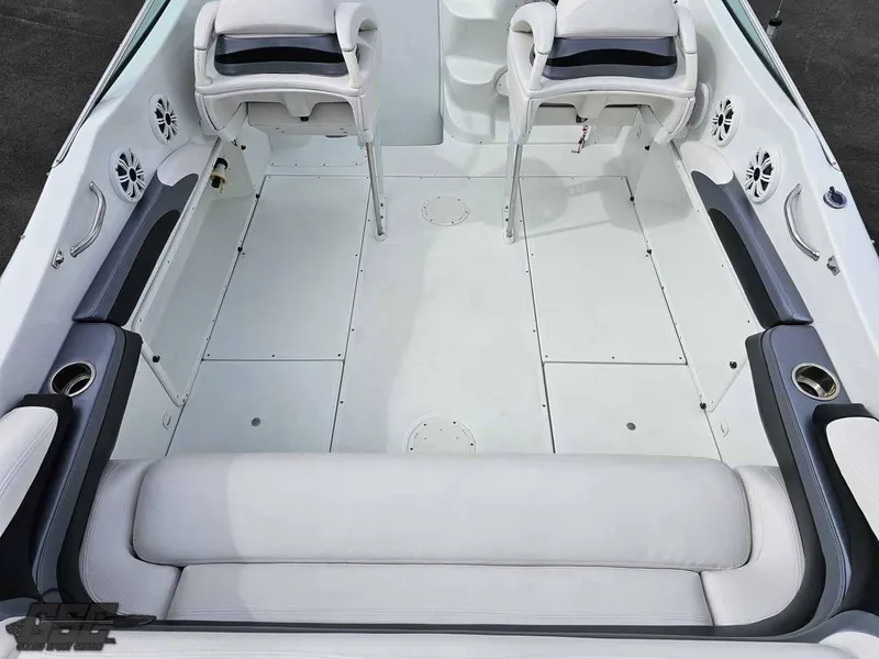Slide: The Image of Spacious interior of a 2003 Baja .38 Special boat with white seating and modern design. - 49