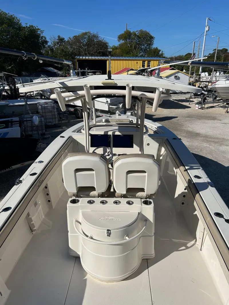 Slide: The Image of 2021 Sea Chaser 30 HFC DC boat with dual consoles and spacious deck layout. - 3