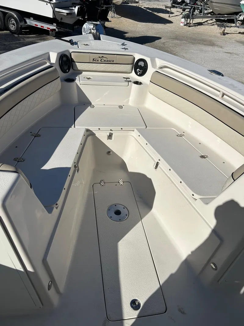 Slide: The Image of 2021 Sea Chaser 30 HFC DC boat interior with spacious seating and storage. - 6