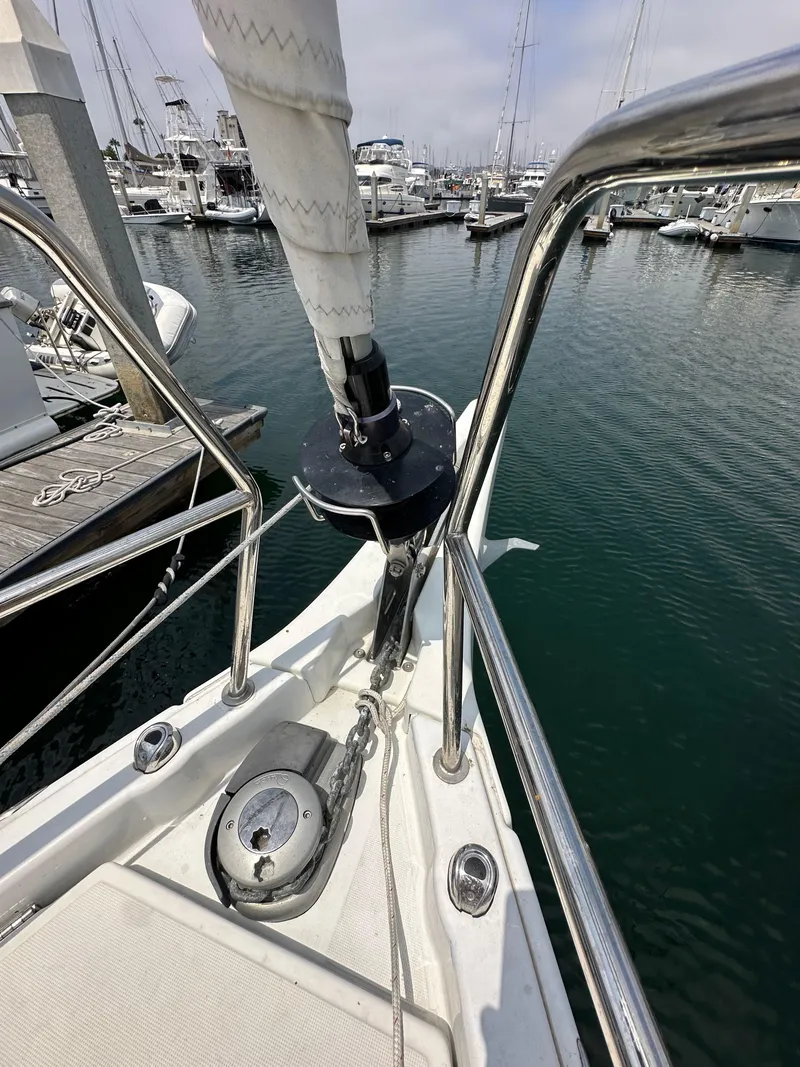 Slide: The Image of Jeanneau Sun Odyssey 410 sailboat bow, docked in marina, 2020 model. - 30
