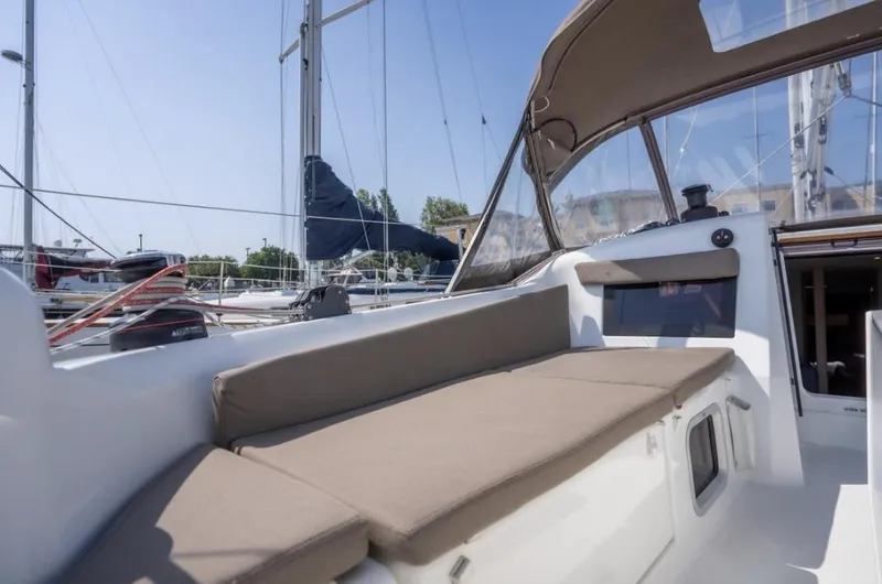 Slide: The Image of Jeanneau Sun Odyssey 410, 2020 model, featuring a spacious deck with comfortable seating. - 48