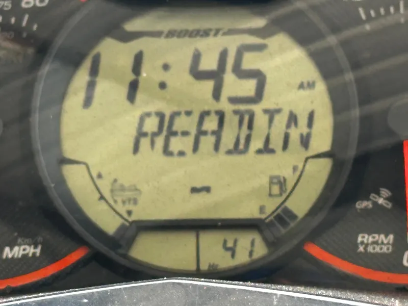 Slide: The Image of Close-up of 2018 Sea-Doo RXP-X 300 dashboard displaying time and "READIN" message. - 7