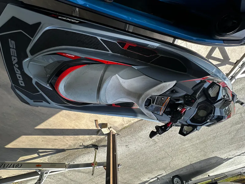 Slide: The Image of 2018 Sea-Doo RXP-X 300 jet ski, top view, parked on a trailer. - 9