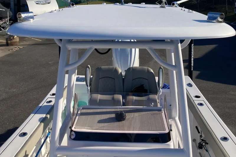 Slide: The Image of 2023 Sportsman Open 242 Center Console boat with dual seats and T-top. - 9