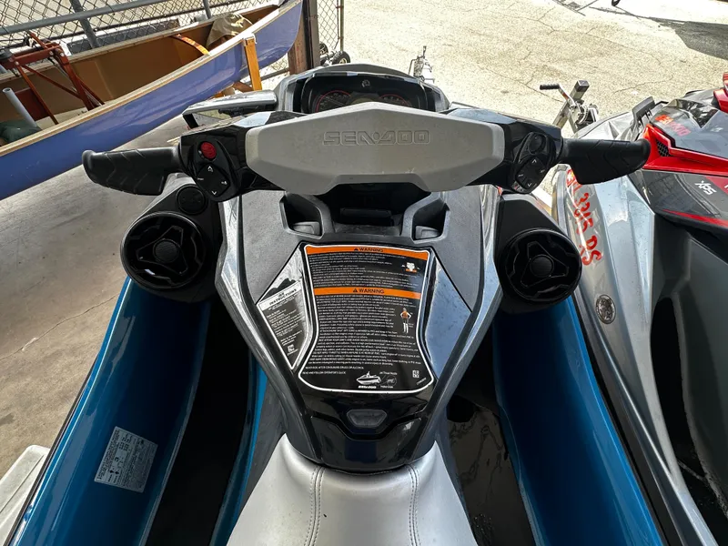 Slide: The Image of 2018 Sea-Doo GTX 230 jet ski dashboard with handlebars and control panel. - 6