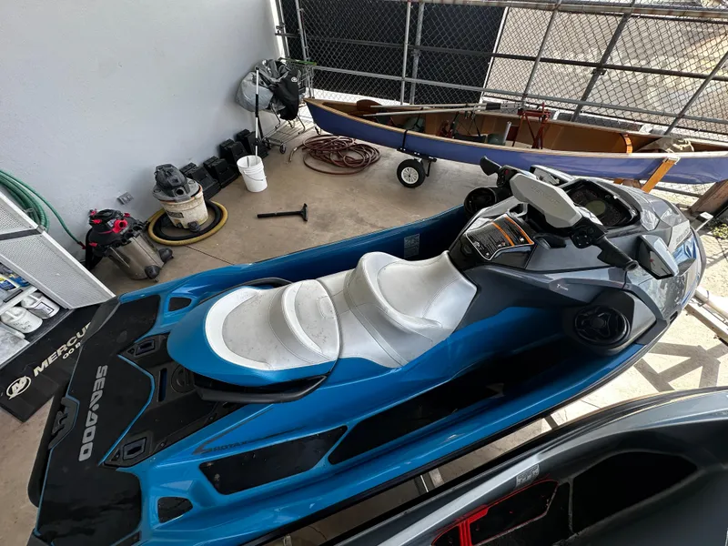 Slide: The Image of 2018 Sea-Doo GTX 230 jet ski in a garage setting. - 9