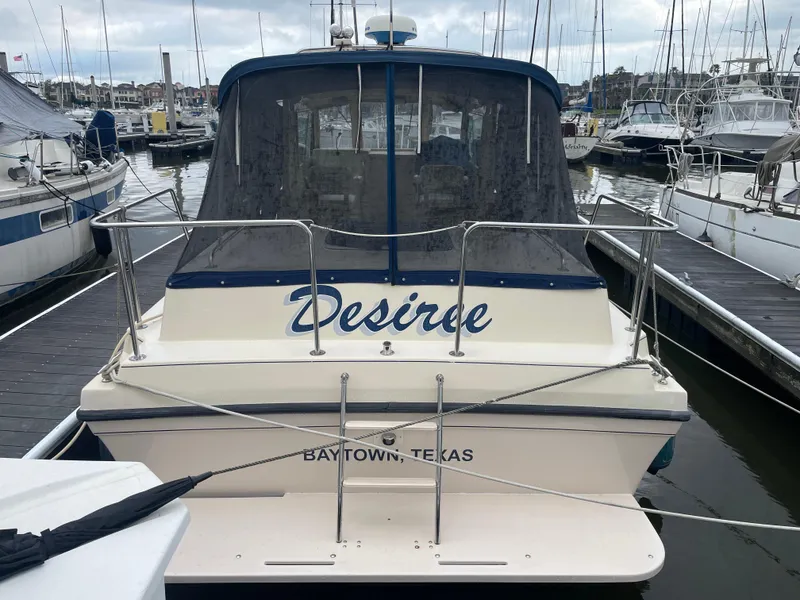 Slide: The Image of 2004 Albin 30 Family Cruiser named "Desire" docked in Baytown, Texas marina. - 6