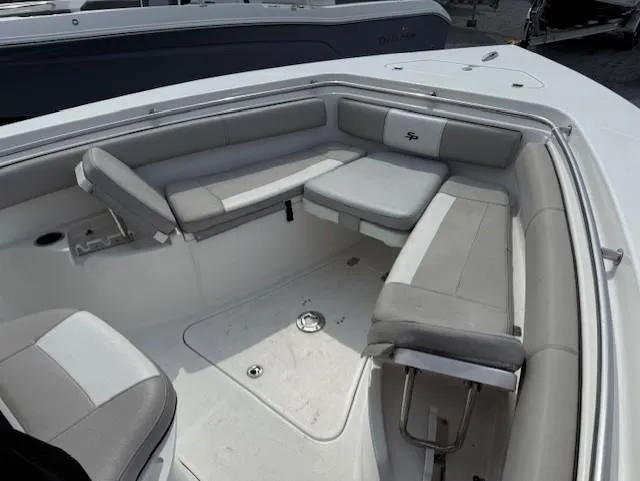 Slide: The Image of 2018 Sea Pro 239 Center Console boat with spacious seating area. - 15