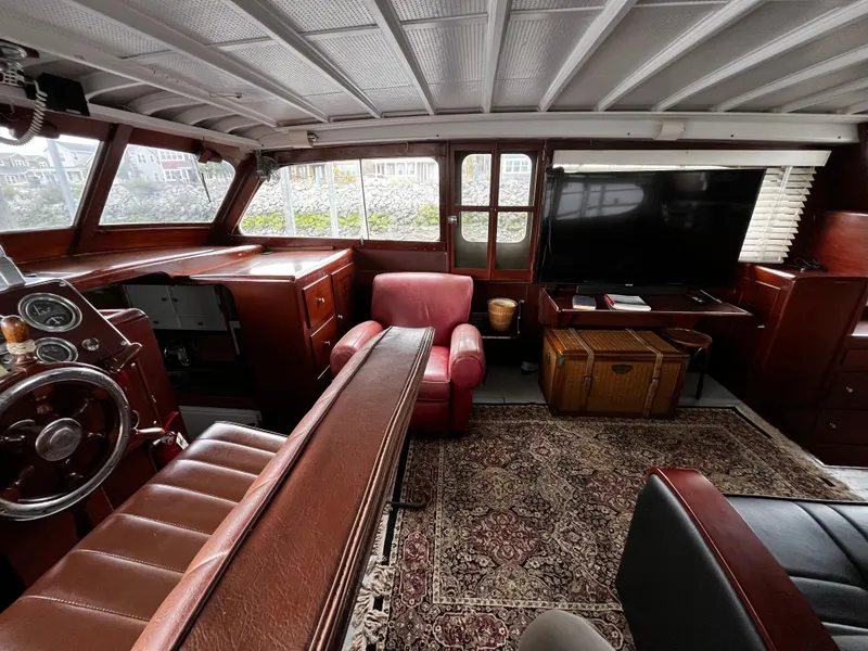 Slide: The Image of 1948 Chris-Craft Double Cabin interior with vintage decor and steering wheel. - 20