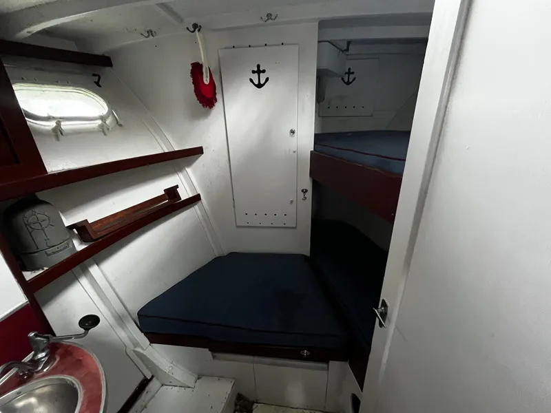 Slide: The Image of 1948 Chris-Craft Double Cabin interior with bunk beds and nautical decor. - 35