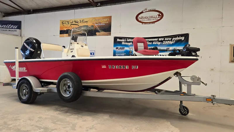 Slide: The Image of 2008 Mako Inshore 1801 boat on trailer in indoor storage facility. - 2