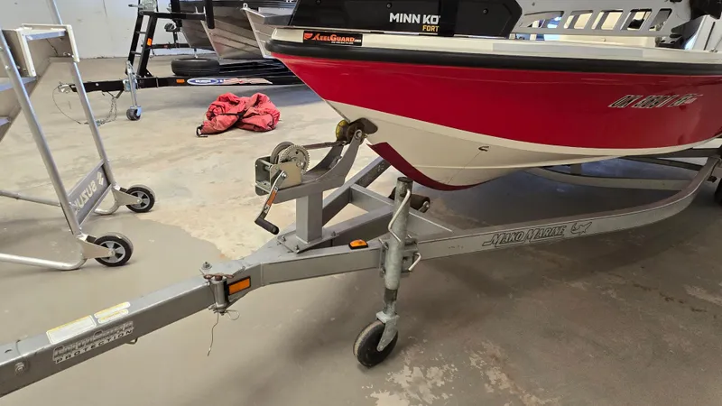 Slide: The Image of 2008 Mako Inshore 1801 boat on trailer in garage setting. - 4