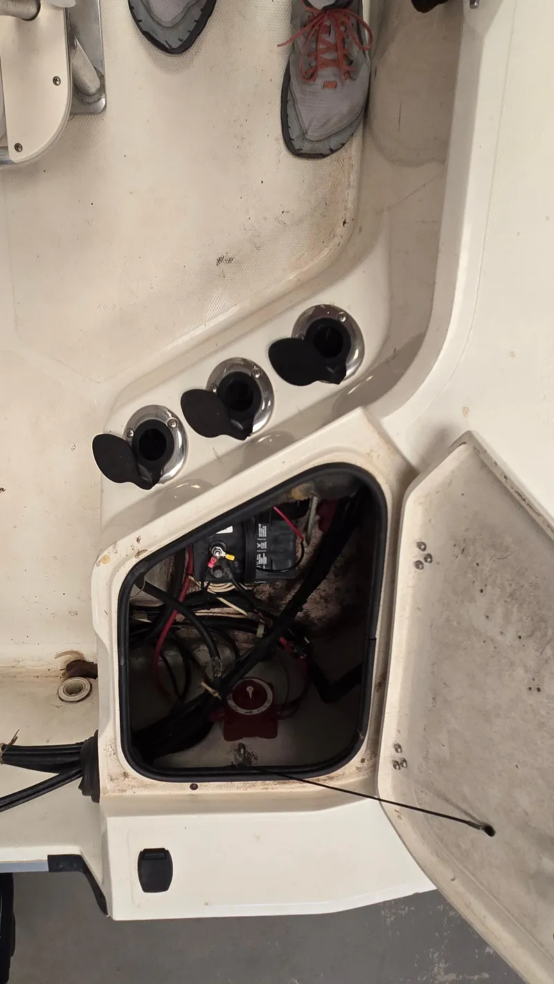 Slide: The Image of 2008 Mako Inshore 1801 boat interior showing wiring and components. - 8