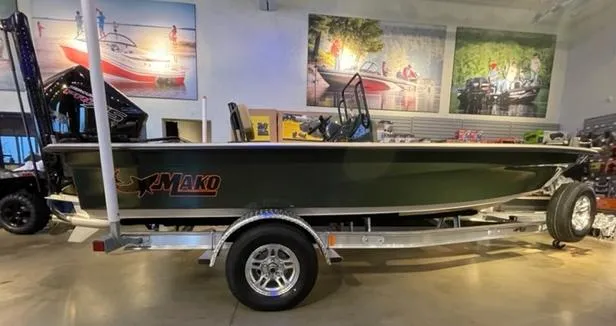 The Image of 2025 Mako 18 Pro Skiff Backwater Edition on trailer in showroom. - 0