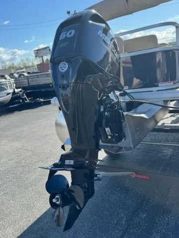 Slide: The Image of 2025 Sun Tracker Bass Buggy 18 DLX with Mercury 60 HP outboard motor. - 3