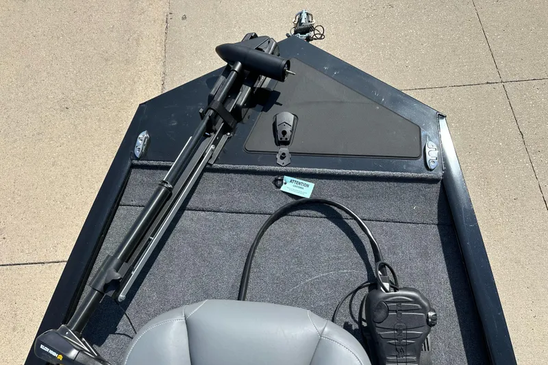 Slide: The Image of 2025 Tracker Pro 170 boat interior with trolling motor and seating. - 3