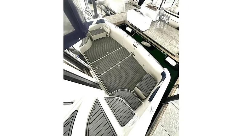 Slide: The Image of 2009 Carver 36 Mariner boat interior with sleek, modern design and spacious seating area. - 8