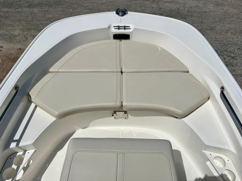 Slide: The Image of 2022 Boston Whaler 17 Montauk boat interior with cushioned seating. - 10