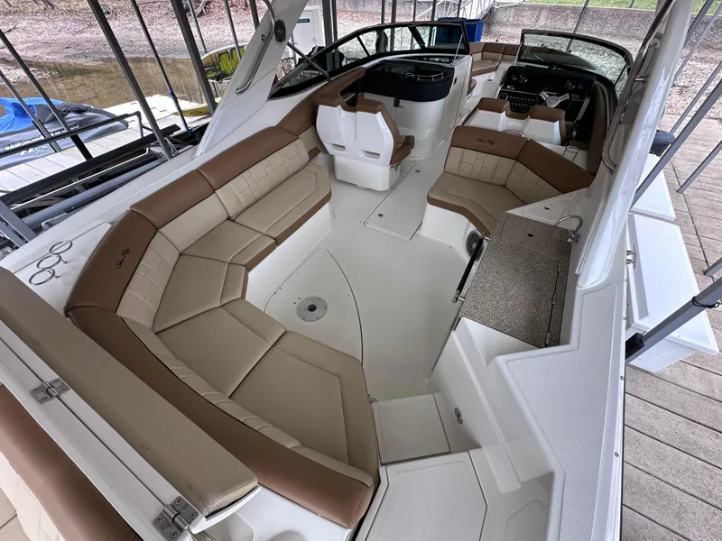 Slide: The Image of 2014 Sea Ray 350 SLX boat interior with spacious seating and modern design. - 16
