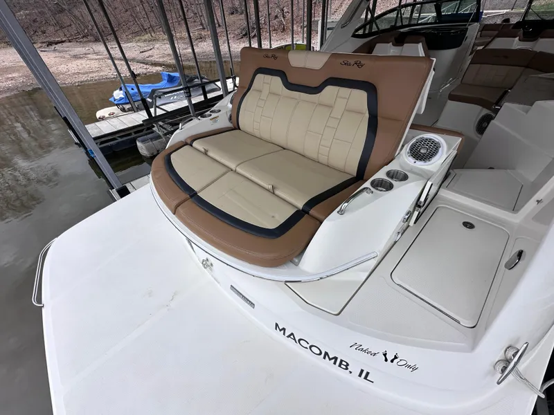 Slide: The Image of 2014 Sea Ray 350 SLX boat with tan seating, docked in Macomb, IL. - 22