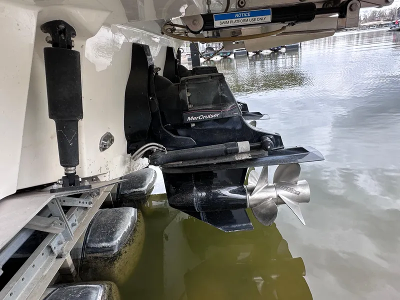 Slide: The Image of 2014 Sea Ray 350 SLX boat with MerCruiser outdrive in water. - 41