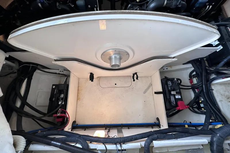 Slide: The Image of Engine compartment of a 2014 Sea Ray 350 SLX boat, showing wiring and components. - 43