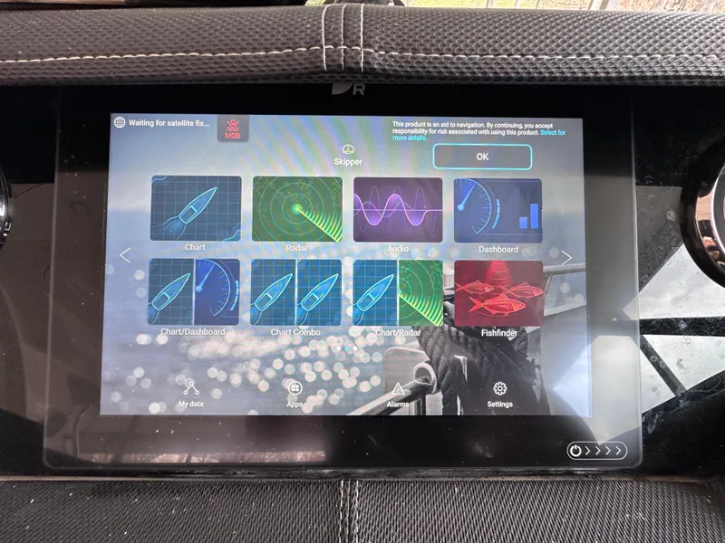 Slide: The Image of Touchscreen display on 2014 Sea Ray 350 SLX boat showing navigation and radar options. - 7