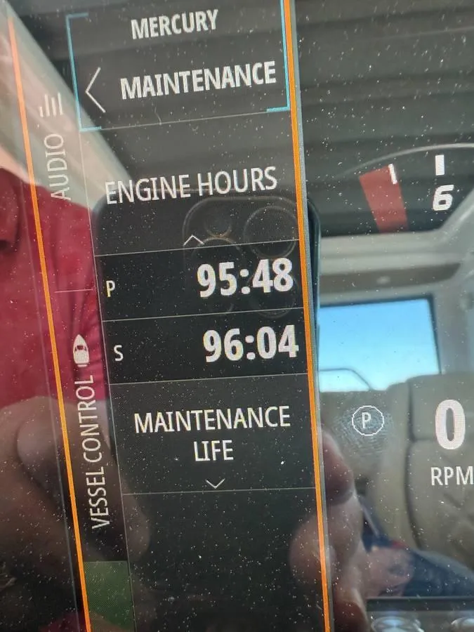 Slide: The Image of Axopar 28 CABIN 2021 maintenance display showing engine hours and maintenance life. - 6