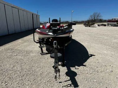 Slide: The Image of 2024 Blazer 650 Pro Tour boat on trailer in outdoor storage area. - 2