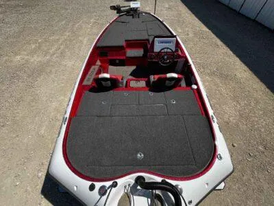 Slide: The Image of 2024 Blazer 650 Pro Tour boat with red and black interior, viewed from above. - 6