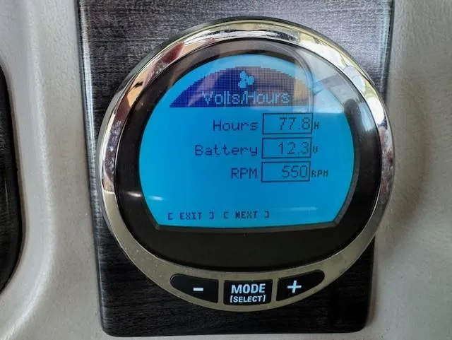 Slide: The Image of Digital display showing hours, battery voltage, and RPM on a 2017 Harris Solstice DC 250. - 10