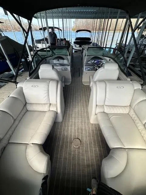 Slide: The Image of 2017 Harris Solstice DC 250 pontoon boat with spacious seating and elegant interior design. - 11
